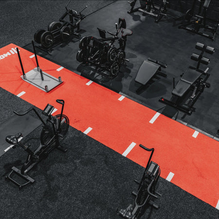 Custom gym space with various equipment, designed to transform and upgrade fitness efficiency.