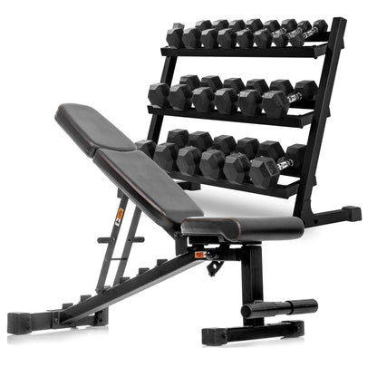 5-50 lb hex dumbbell set with storage rack and adjustable weight bench for home gym exercises.