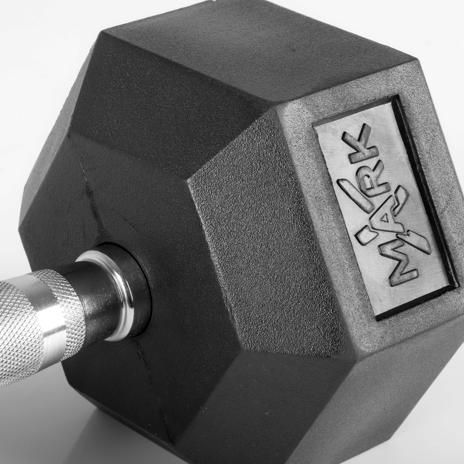Close-up of a rubber hex dumbbell featuring a chrome handle and textured grip for comfortable use.