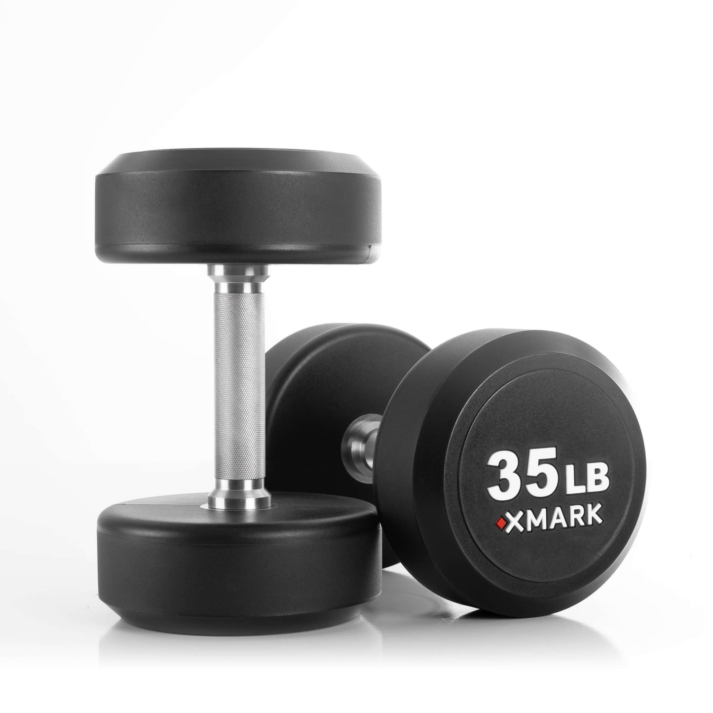 Two XMARK 35 lb commercial round urethane dumbbells showcasing quality and durability for strength training.