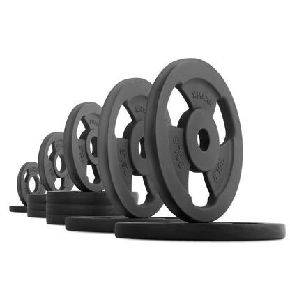 Iron Horse cast iron Olympic weight plates lined up, showcasing classic design for traditional strength training.