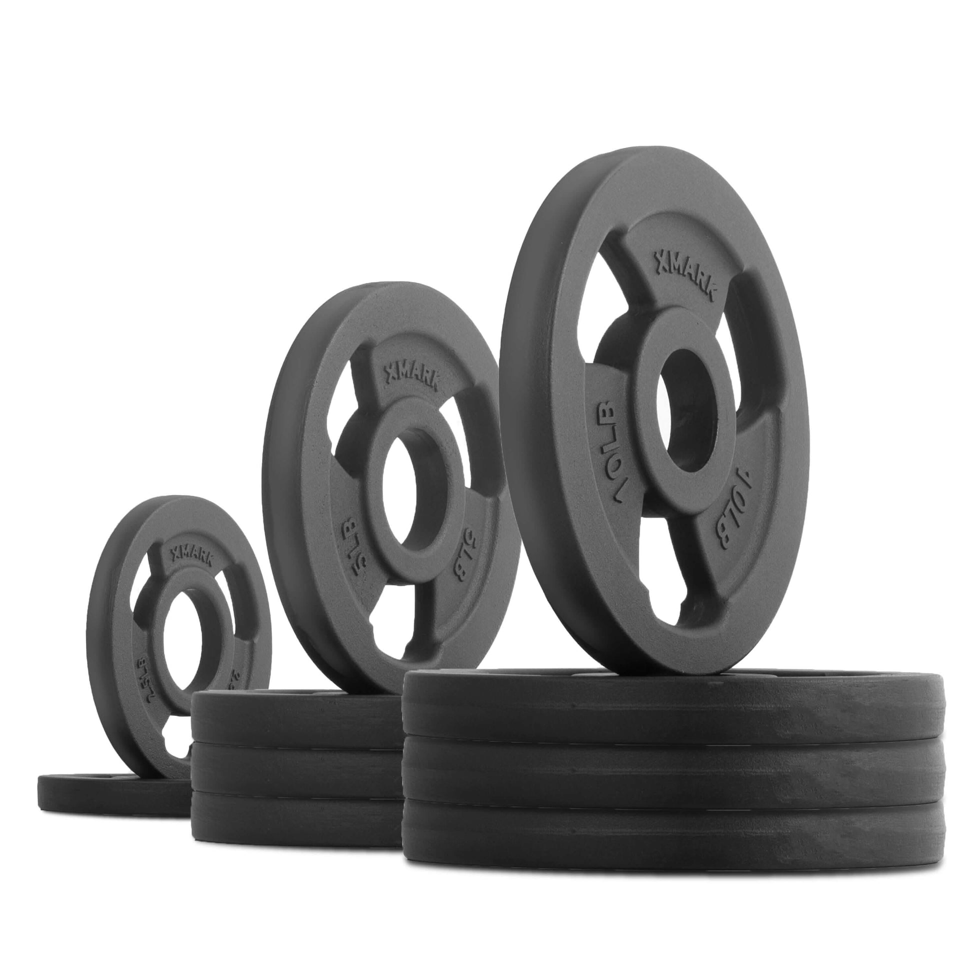 Iron Horse cast iron Olympic weight plates in various sizes, showcasing old-school strength training aesthetics.