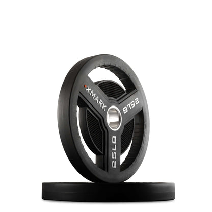 XMARK 25LB Commercial Urethane Olympic Weight Plate with tri-grip handles for versatile gym use.