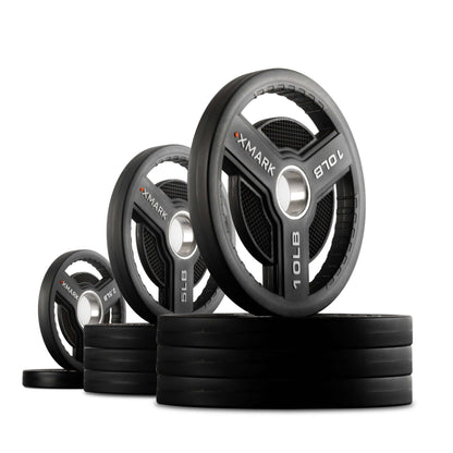 Commercial Urethane Olympic weight plates in various sizes on display, designed for durability and versatility in workouts.