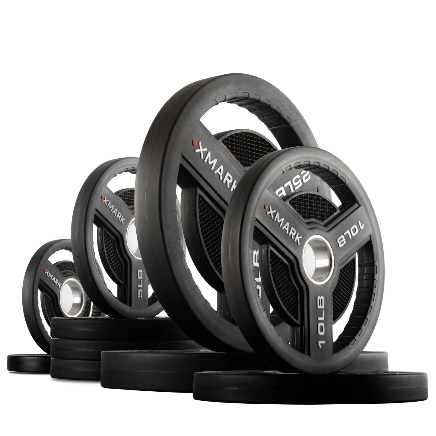 XMARK Commercial Urethane Olympic Weight Plates with tri-grip handles, showing various weights stacked for gym use.