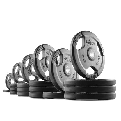 Tri-Grip Olympic weight plates stacked, showcasing different sizes for free-weight strength training.