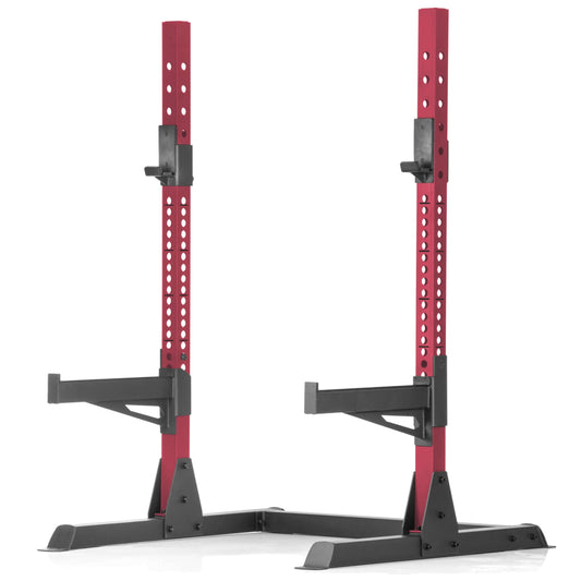 Red and black squat rack bench press with adjustable safety spotters and sturdy base.