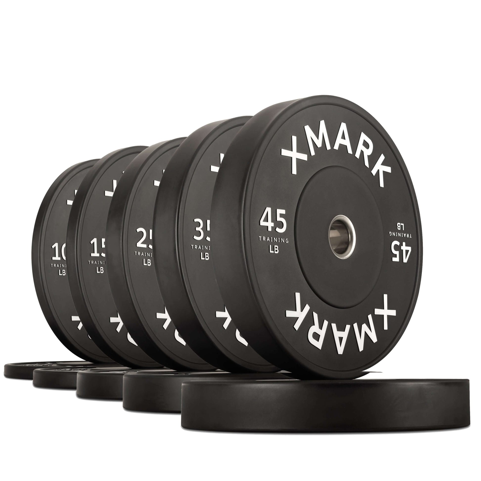 Set of black training weight plates labeled XMARK with various weights, ideal for fitness enthusiasts.