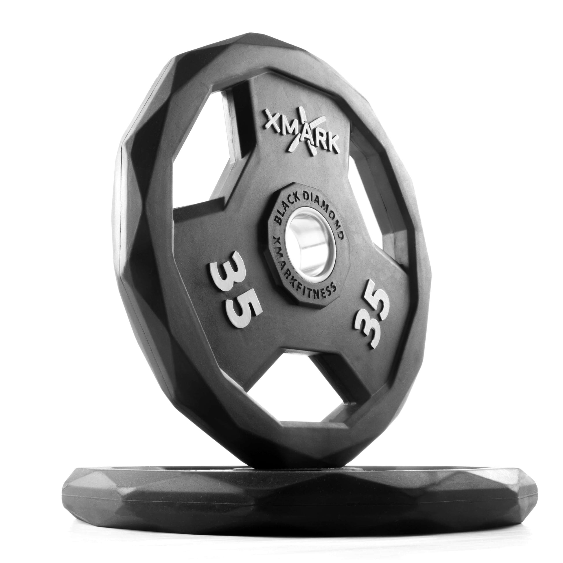 Black Diamond® 35 lb Olympic weight plates featuring a unique design and solid rubber encasing for durability and color retention.
