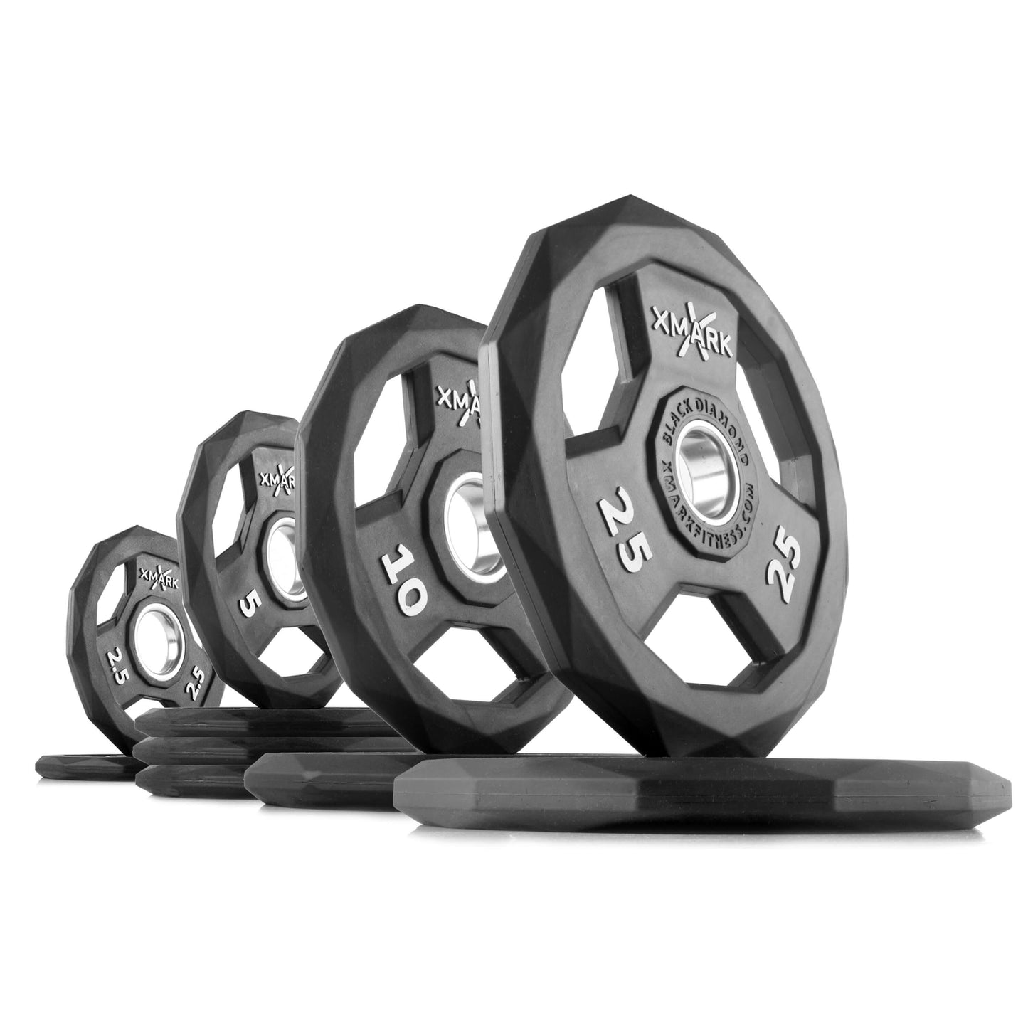 Black Diamond Olympic weight plates in various sizes, showcasing solid design and durable rubber encasing for gym use.