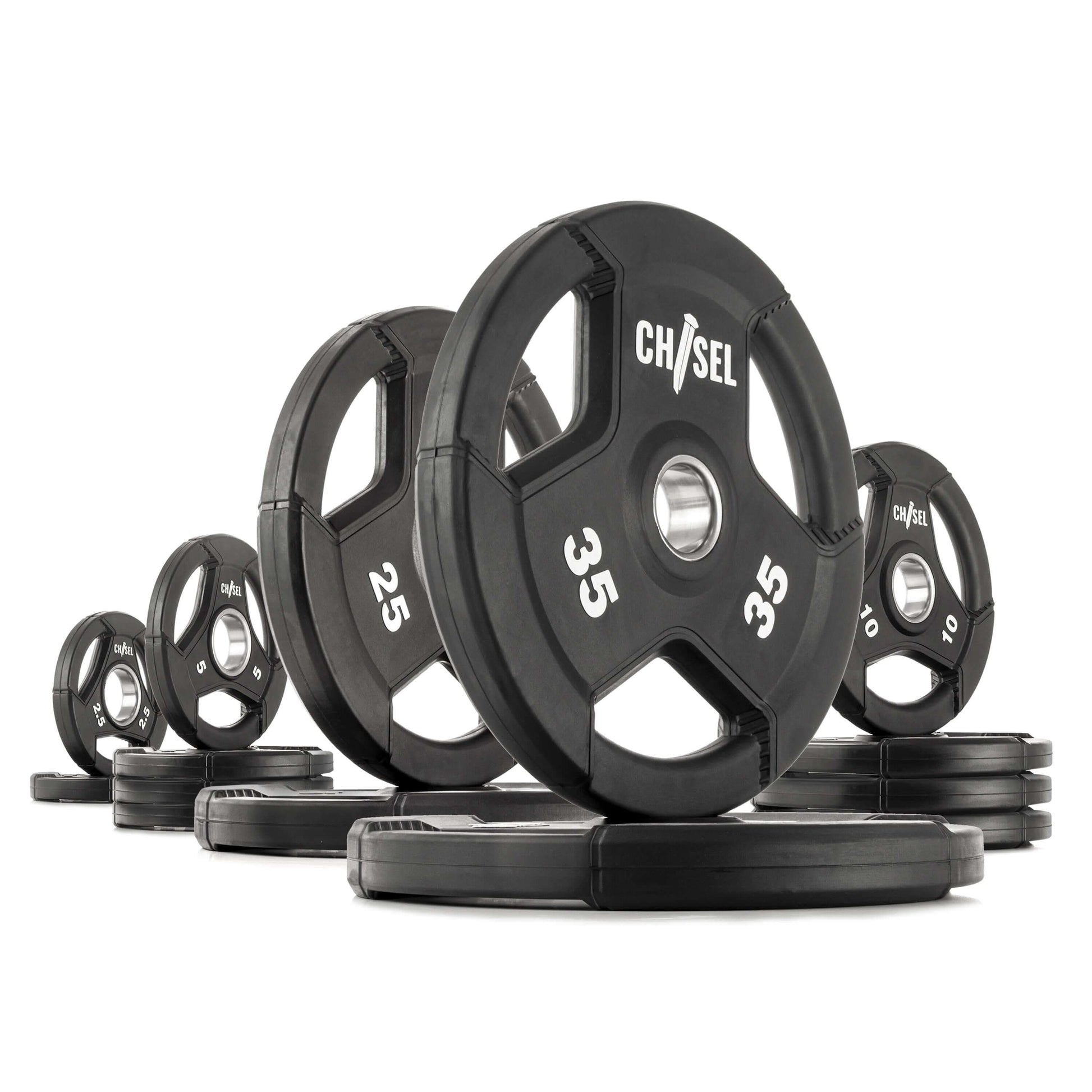 Chisel Olympic weight plates in various sizes, featuring tri-grip handles and a sleek black rubber design.