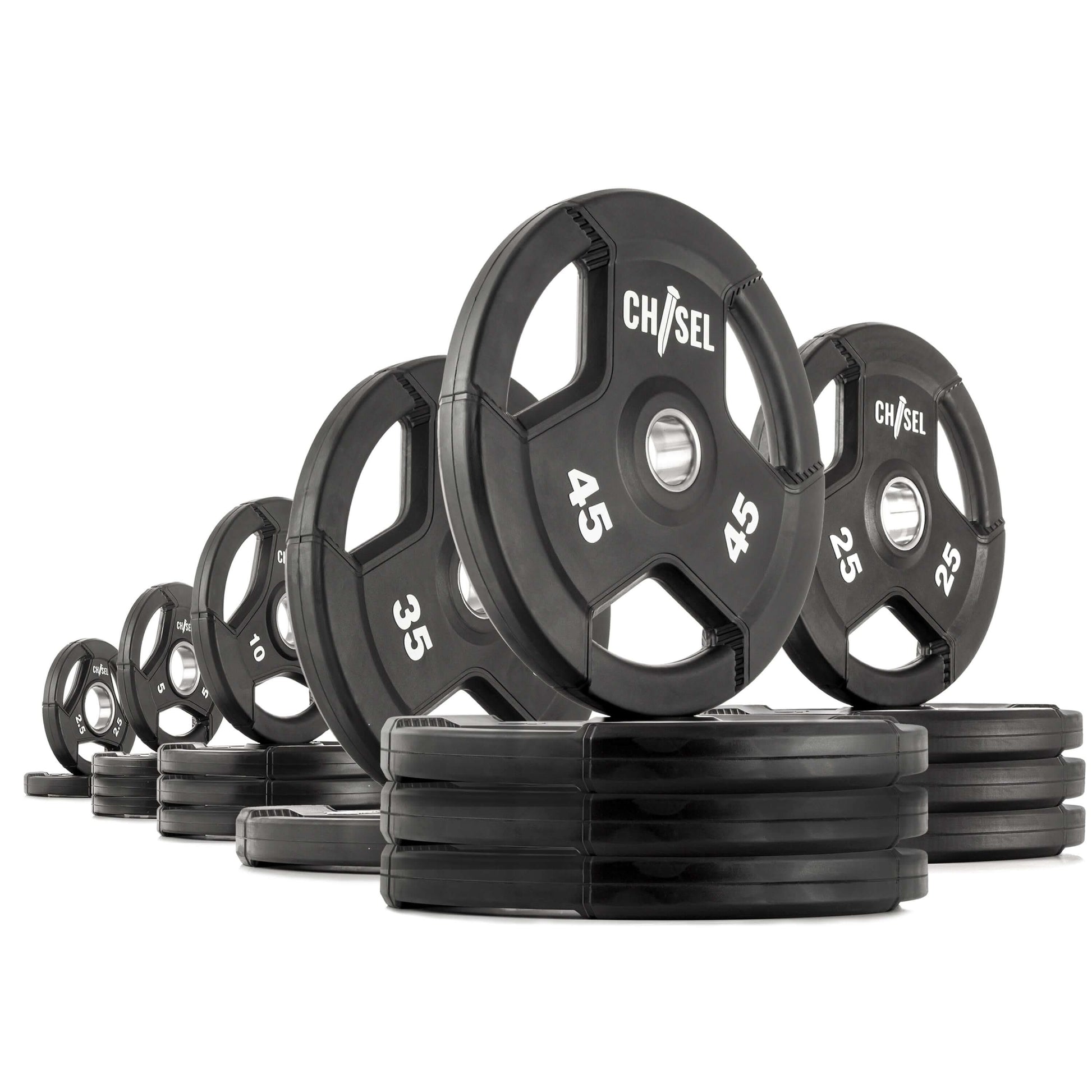 Chisel Olympic weight plates in various sizes stacked, featuring recessed tri-grip handles and a rubber-encased design.