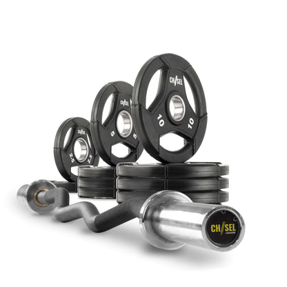 Chisel Olympic weight plates and curl barbell set, featuring various weights for customizable strength training.