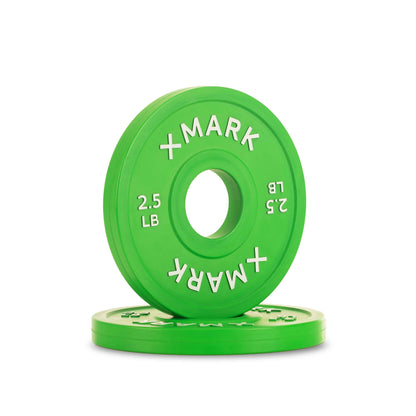 Green 2.5 lb Olympic change plate with embossed lettering, featuring a solid steel core and matte finish for precision workouts.