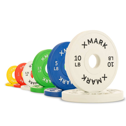 Color-coded Olympic change plates in pounds, featuring weights from ½ to 10 lbs, encased in durable virgin rubber.