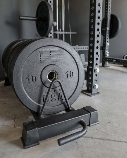 USA Bumper Plates - profile view with plates stored on a rack