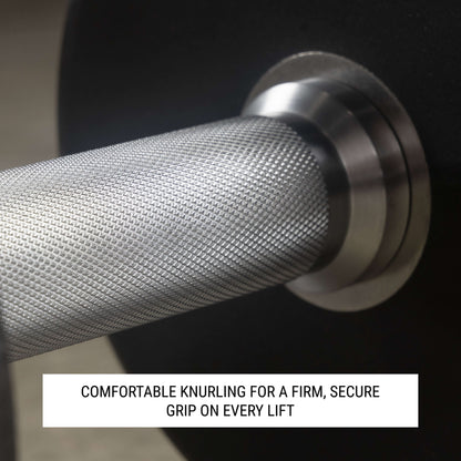 Close-up of dumbbell handle showing knurling design for a secure grip during strength training.