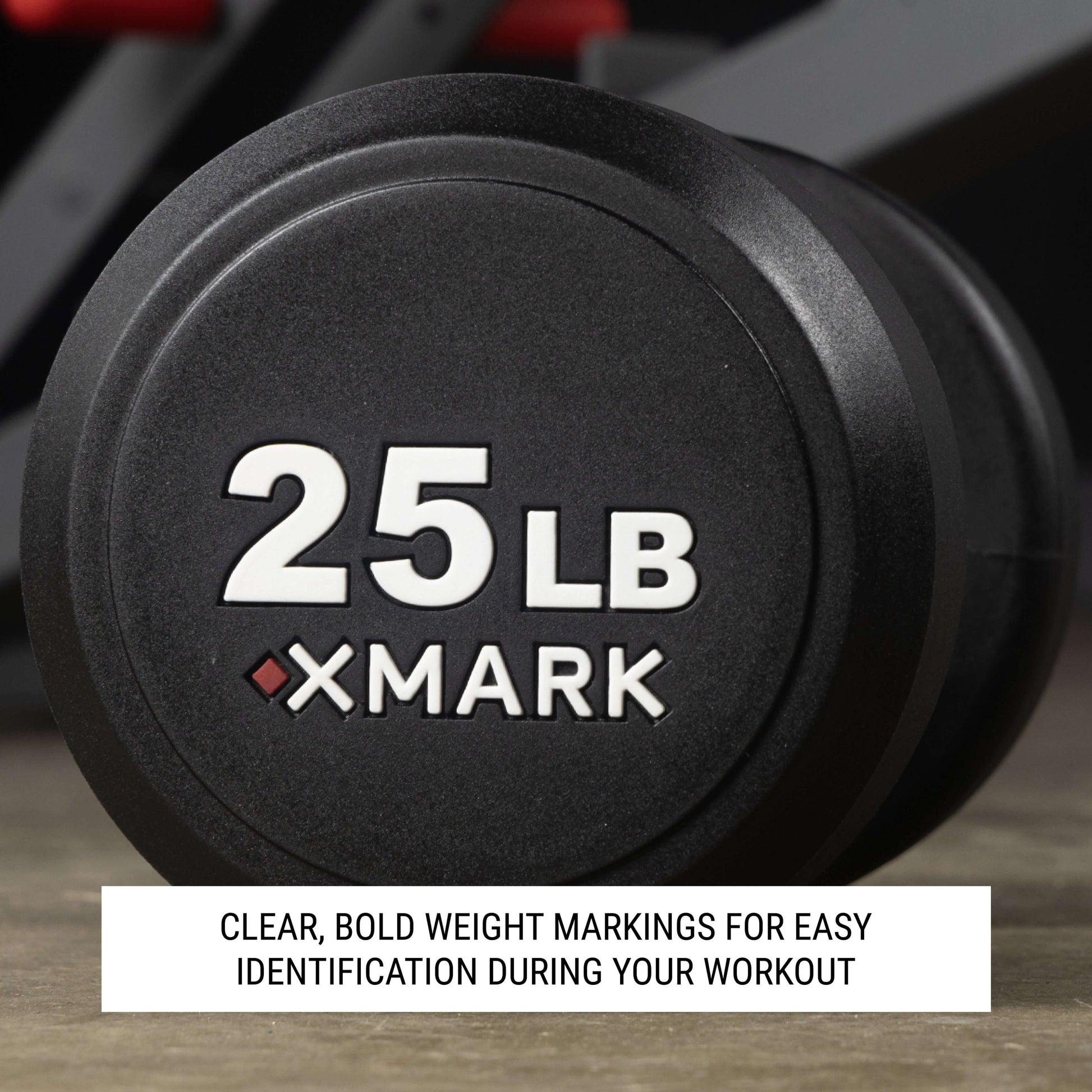 25 lb XMARK round dumbbell with clear weight markings for easy identification during workouts.
