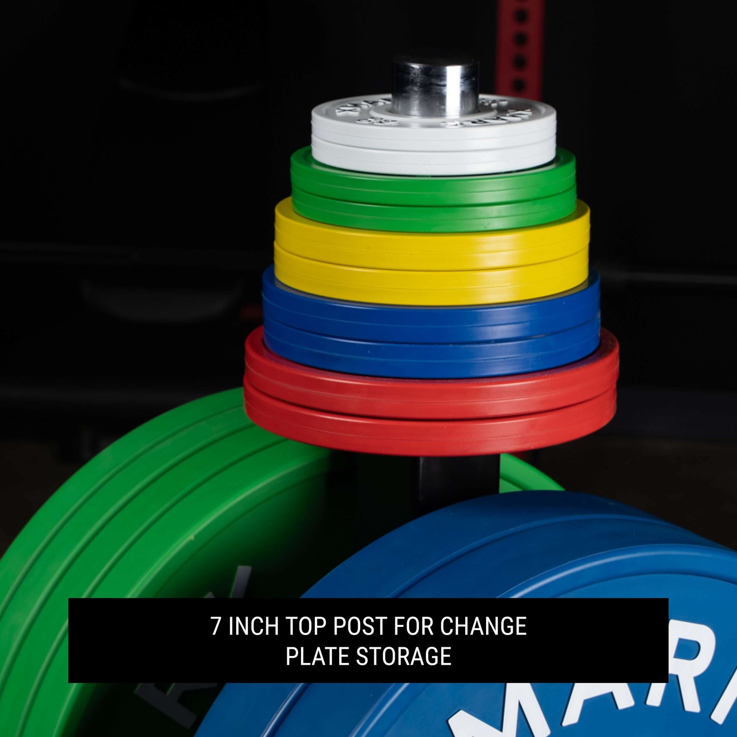 Colorful weight plates stacked on a 7-inch top post designed for convenient storage of change plates.