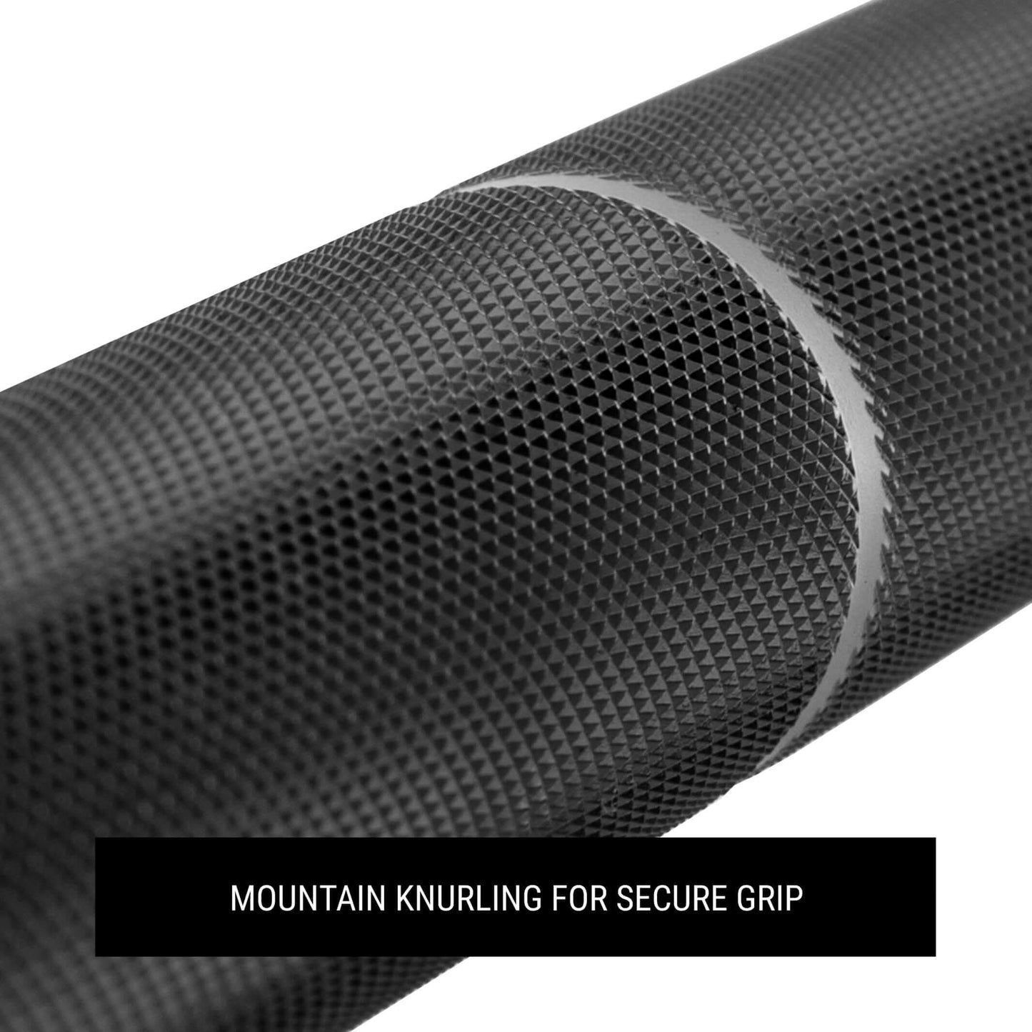 Close-up of mountain knurling on a squat bar for enhanced grip and stability during heavy lifts.