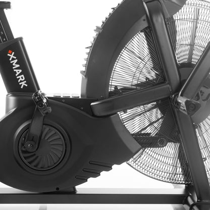 Close-up of the CAT 5 Hurricane Commercial Air Bike's fan and resistance mechanism, emphasizing its robust design.