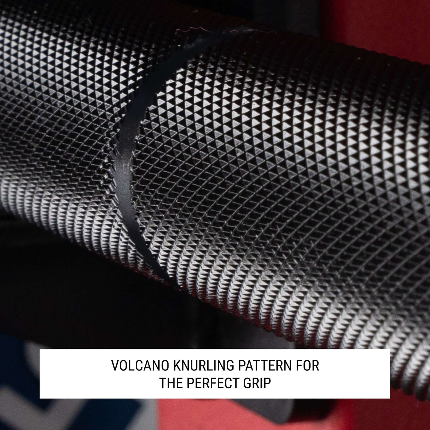 Close-up of volcano knurling pattern on a training bar, showcasing secure grip design for optimal performance.