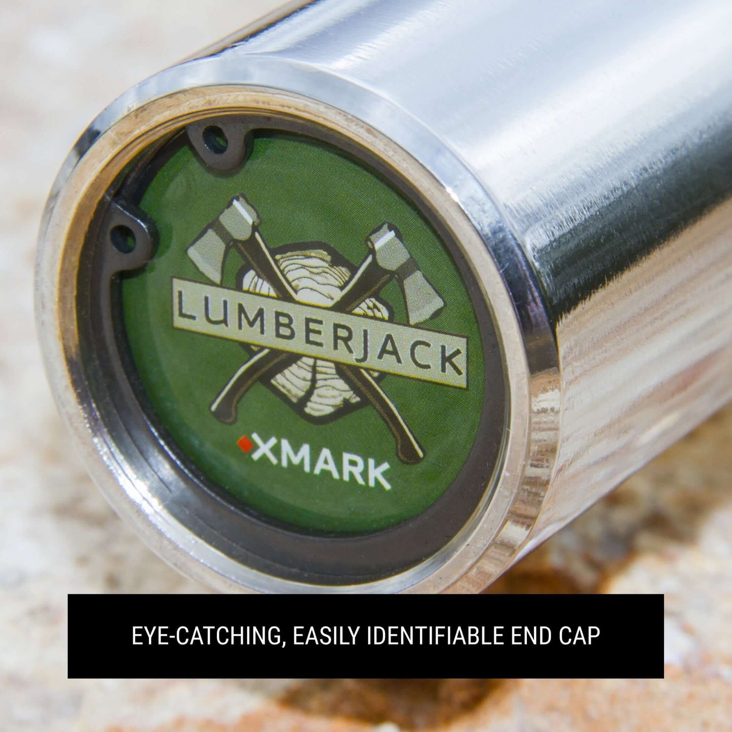 Close-up of Lumberjack® Olympic bar end cap featuring logo and axes design, showcasing durability and branding.