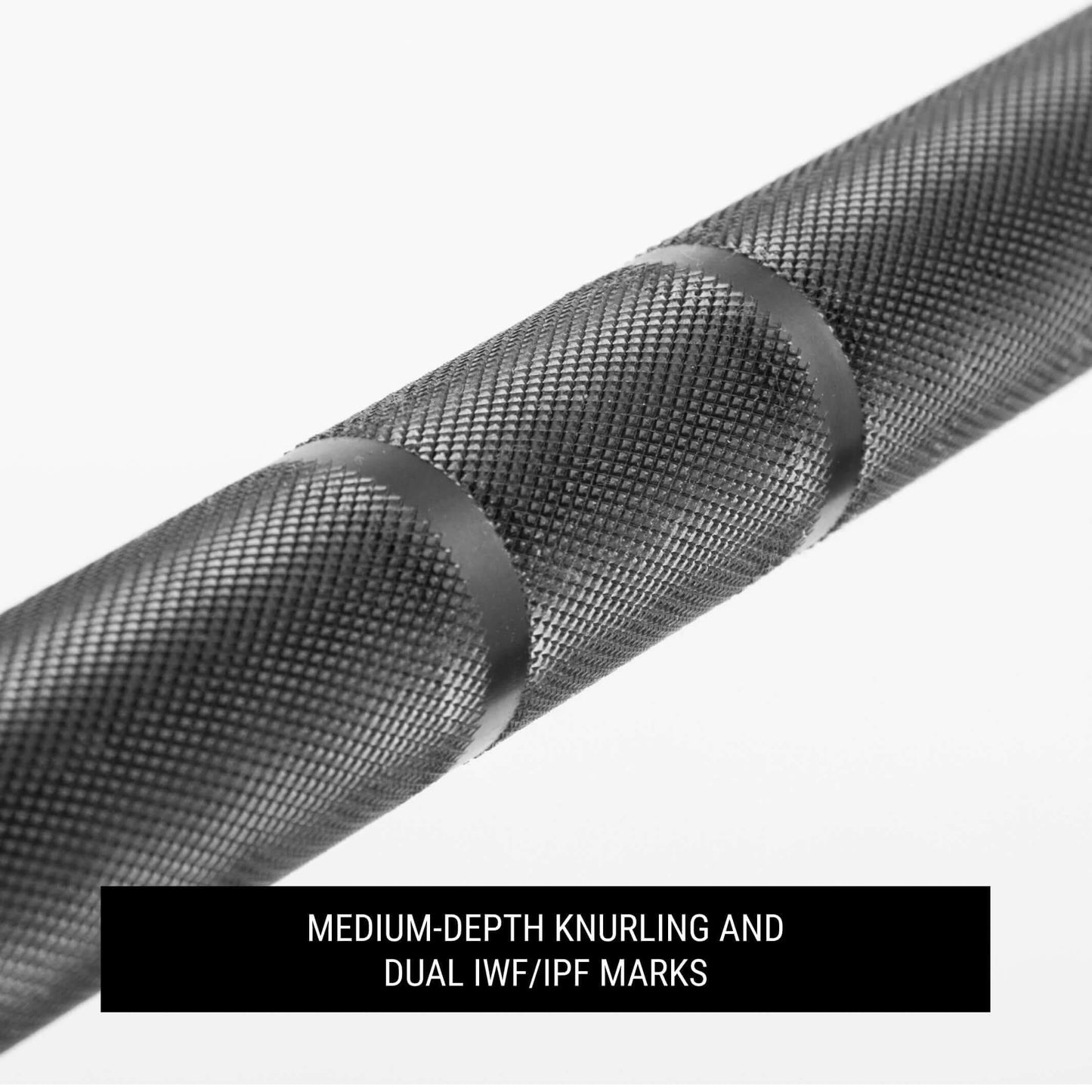 Close-up of a barbell showing medium-depth knurling and dual IWF/IPF marks for improved grip and versatility.