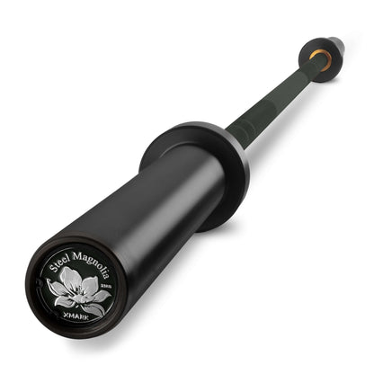 Steel Magnolia IWF women’s training bar showcasing a durable design with a sleek black finish and flower logo.