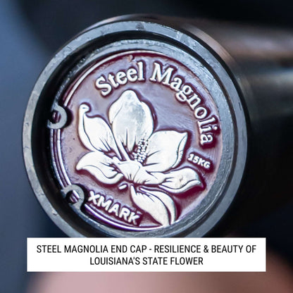 Steel Magnolia end cap featuring a magnolia flower design, symbolizing strength and beauty in a durable black finish.
